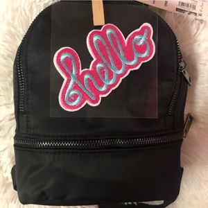 New black nylon mini backpack with handbag strap